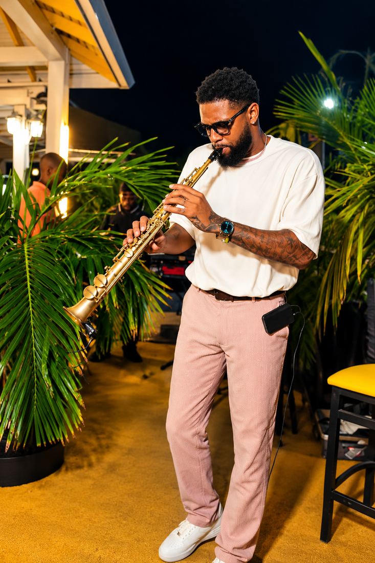 Live sax under the stars at a past Virgoat Bash